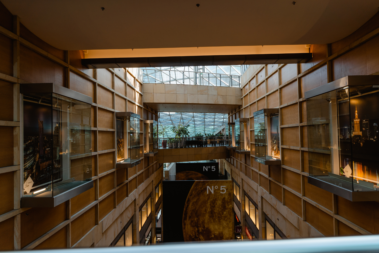 Multi-level commercial building atrium with integrated lighting