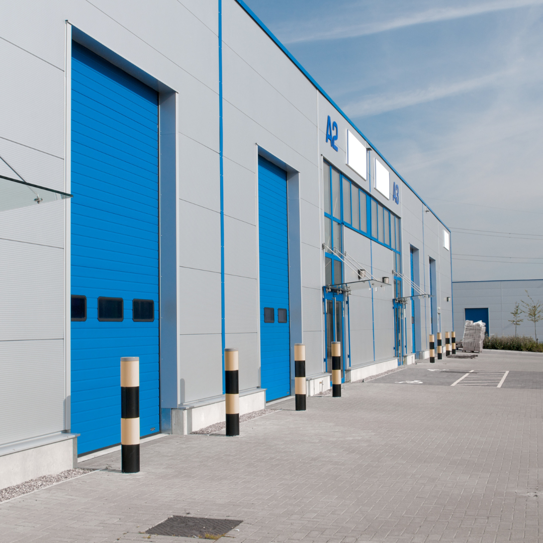 Industrial unit exterior with roller-shutter loading doors