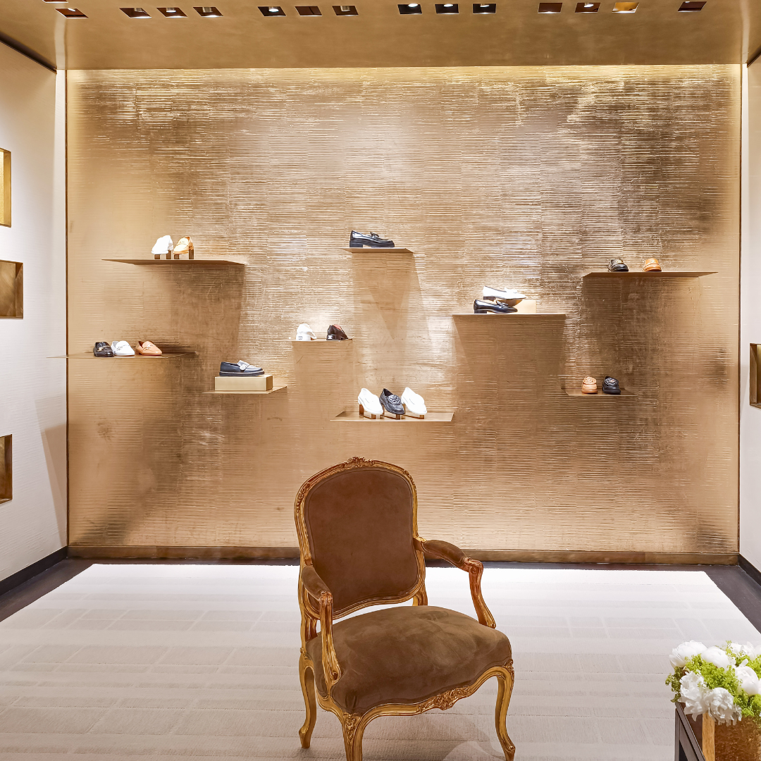 Boutique retail display wall with integrated shelf lighting